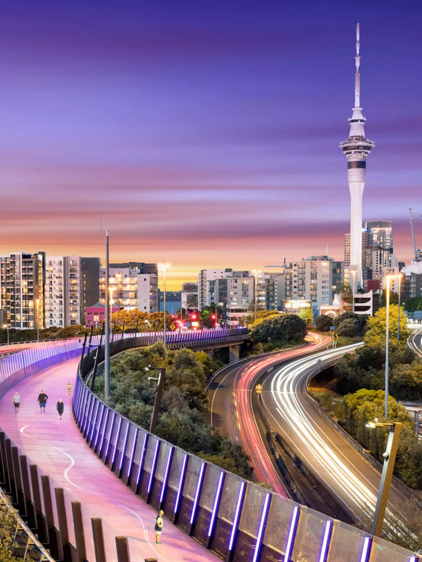 City skyline at dusk representing global perspective